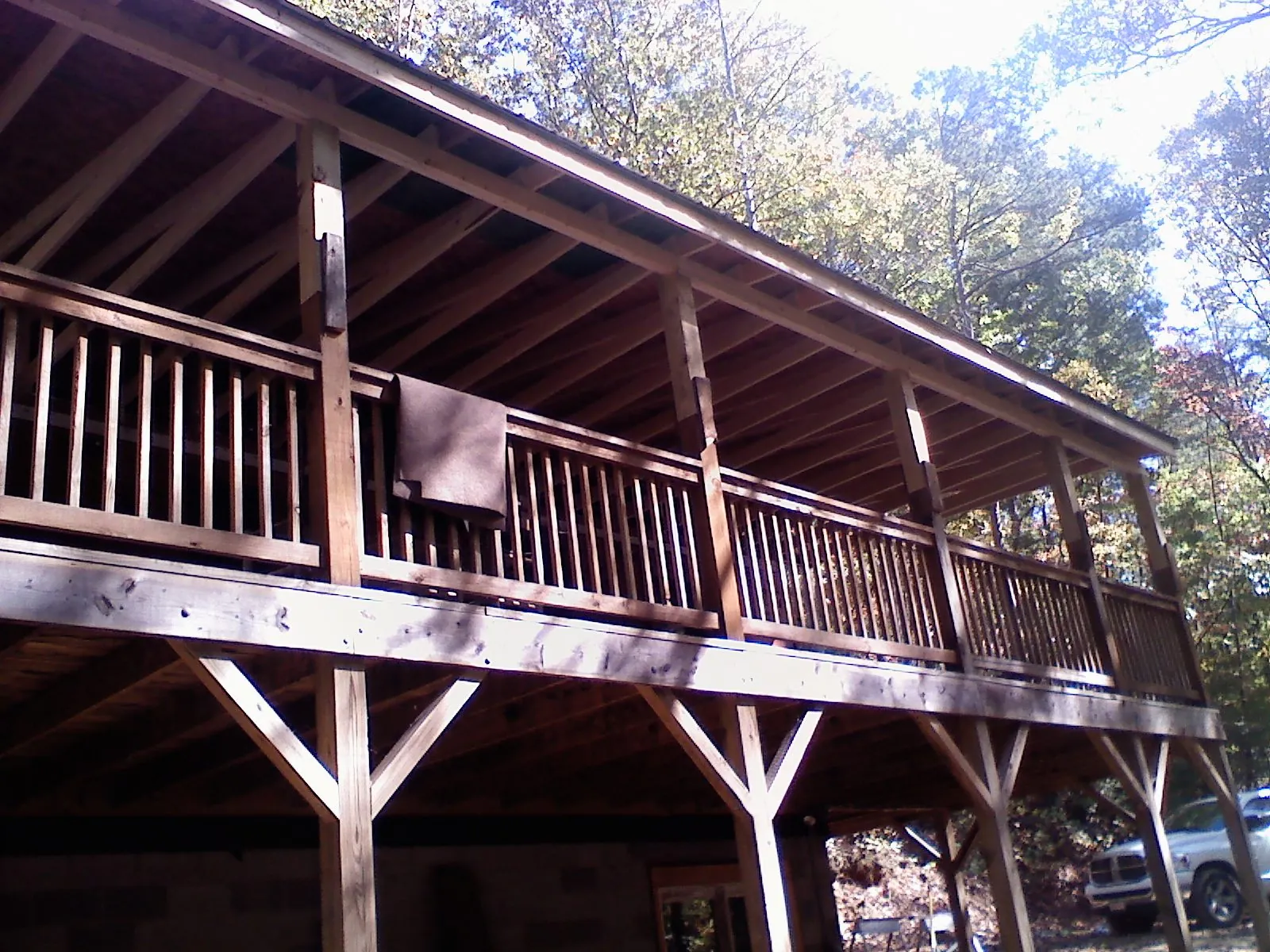 Timber framing under a new elevated porch and deck — Roof Leak Repair in Loma Mar by Roofing Brothers